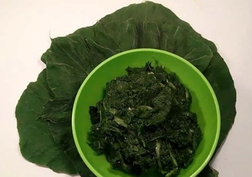 Taro Leaf Mashed on the green pot.