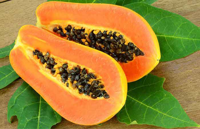 Ripe Caribbean Red Papayas on the leaf.