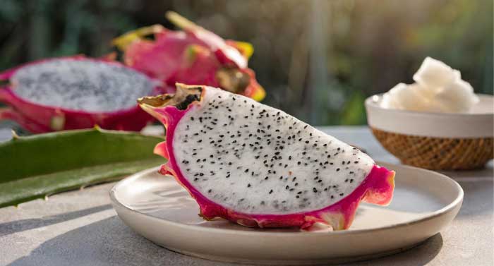 A slice of white dragon fruit on a plate. sun-dried organic pitaya.